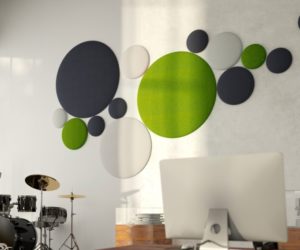 Circular acoustic panels in green, charcoal and white